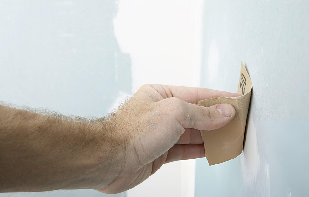 sanding drywall with sandpaper