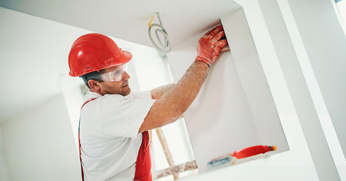 using sanding sponge to smooth out the corners where two walls meets.
