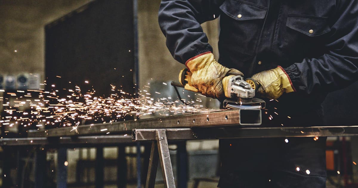 using a angle grinder to trim the edge.